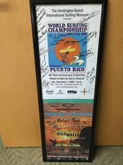 2 posters in 1 frame: HB International Surf Museum Puerto Rico World Surf Championships Nov. 7-14 1968 with signatures and 2008 Surfing Heritage Summer Surf Film Series poster signed