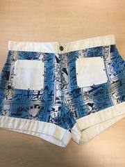 1960 Board Shorts, canvas materiel, white trim and pockets with blue cartoon print design