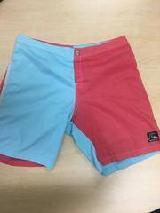 1975 Quiksilver Board Shorts (red and blue)