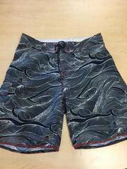 1990 Quiksilver Board Shorts (navy blue and white with red stitching)