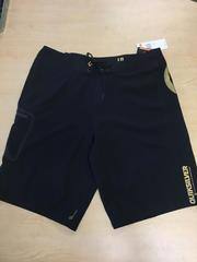 1990 Quiksilver Board Shorts (black with gold emblem and writing)