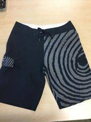 1990 Quiksilver Board Shorts (black with gray ripple pattern on left leg)