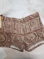 Bikini Factory, Sally Yater Board Shorts, eyelet and laces/Velcro, Barkcloth/Aloha pattern, Brown/White.