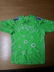 2009 Gidget Pro Rash Guard (Green)
Signed: Steph Gilmore, Sally Fitzgibbons, Carissa Moore, Alana Blanchard