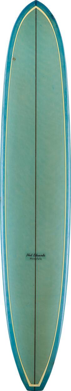 Honolulu Series model C. Foam, turquoise / blue with glassed-on speed fin.

